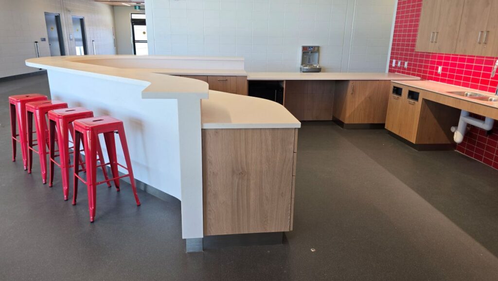 Kitchenette and storage area design for World Cup reception space.