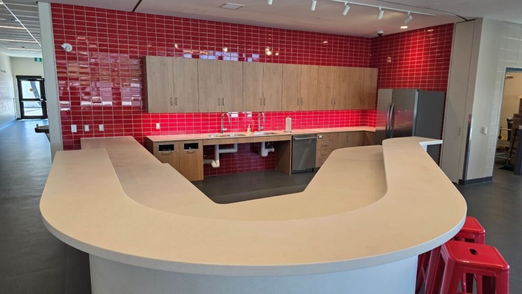 Side view of custom reception area furniture for World Cup 2026.