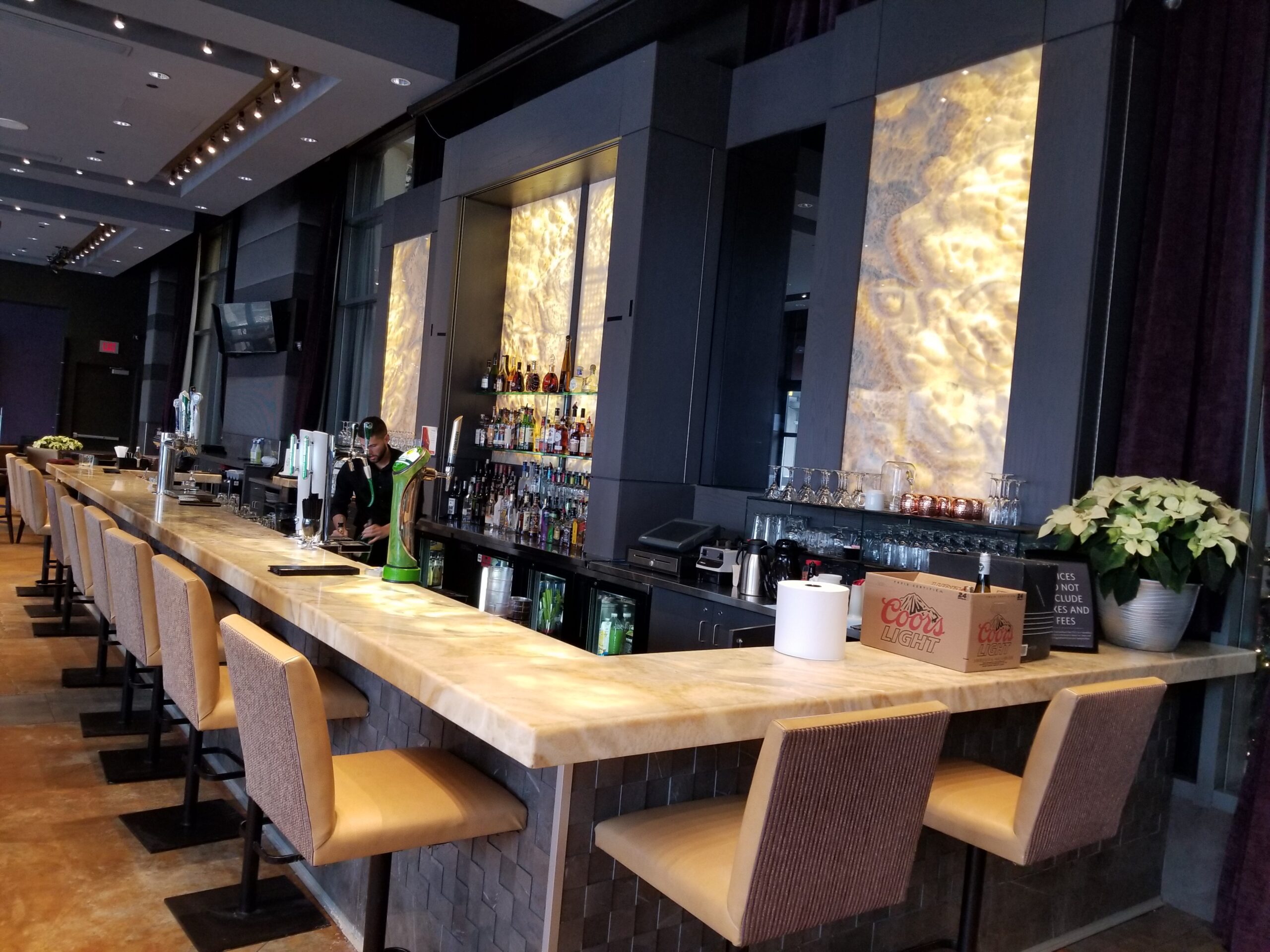Custom-designed onyx stone countertops for a luxury kitchen renovation by Elite Stone.